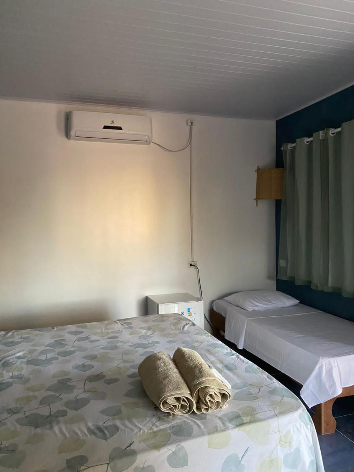 Quarto Triplo com Varanda